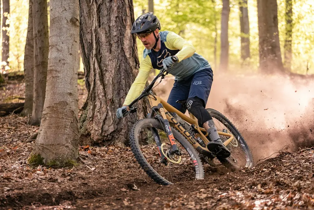 Rider on a mountain bike on a forest trail