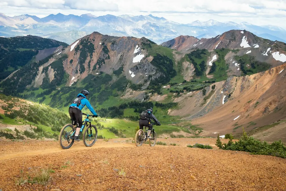 Mountain biker riding along a high rocky ridge